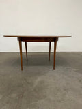 Table ronde extensible en teck vintage – table scandinave avec rallonges années 60