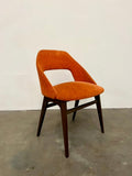 Fauteuil des années 60/70 assise et dossier garnis de velours orangé