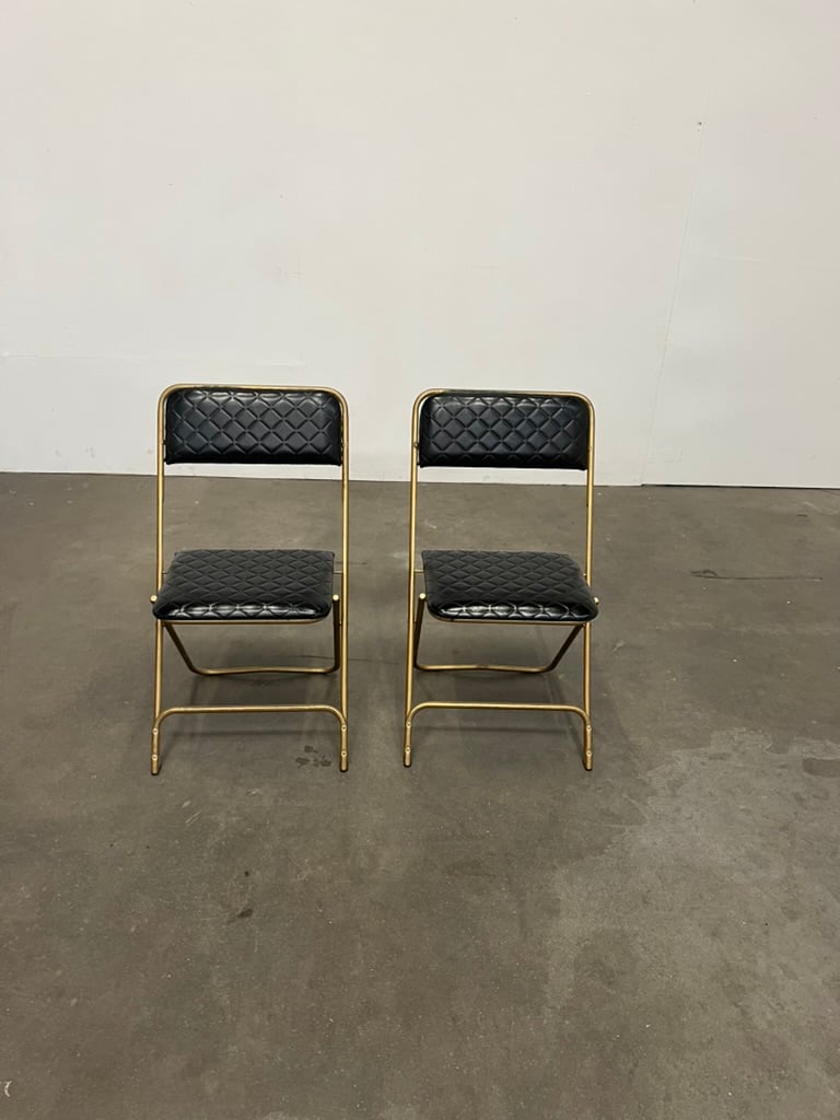 Paire de chaises pliantes Lafuma vintage – métal doré et skaï noir