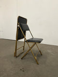 Paire de chaises pliantes Lafuma vintage – métal doré et skaï noir